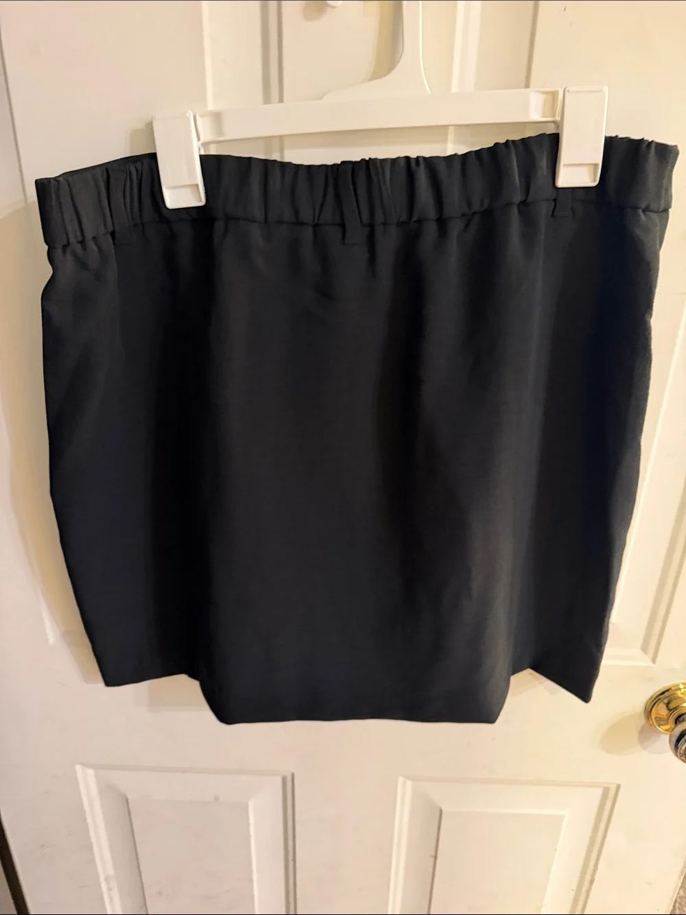 A New Day Black Midi Skirt with elastic waistband.  A-line fit.   Like new.